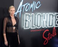 Actress Charlize Theron (Lorraine Broughton) arrives at the premiere of Focus Features' "Atomic Blonde" at The Theatre at Ace Hotel on July 24, 2017 in Los Angeles, California. | Image via: Getty